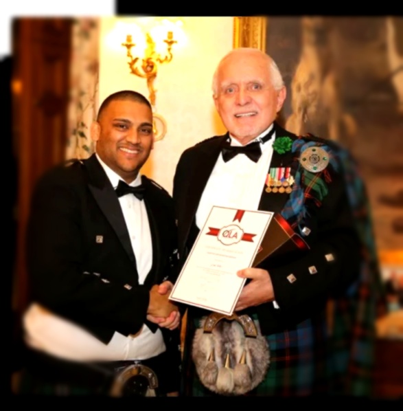 Josh Pather receiving QLA award